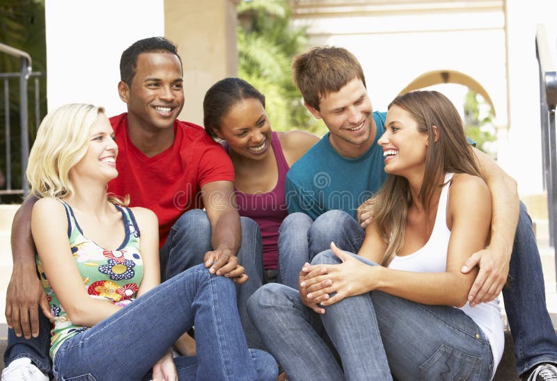 Group of Friends Sitting on Steps of Building Stock Image - Image of ...