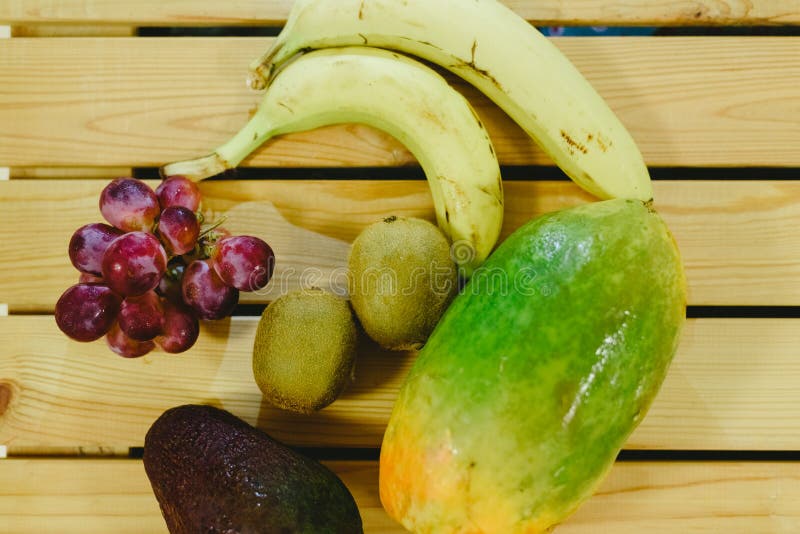 Group of Fruits Papaya, Grape, Kiwi and Bananas Stock Photo Image of