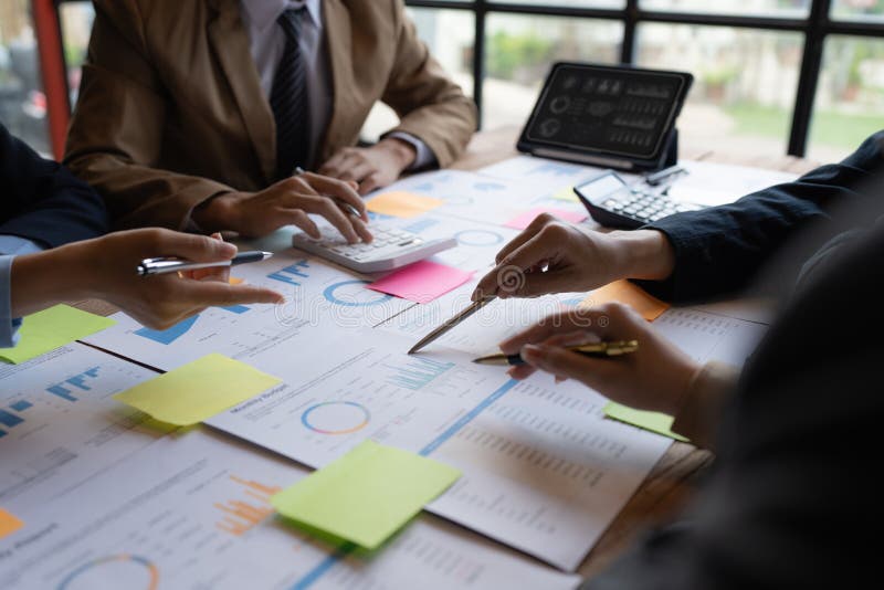 Group of Fund Manager Analyzing Big Data for Future Investment Stock