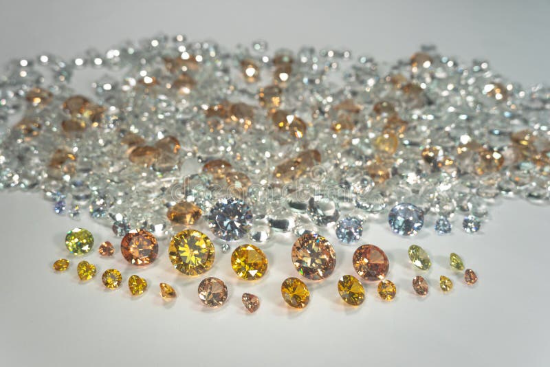 .a Group of Golden Diamonds Arranged in a Row in Front of White