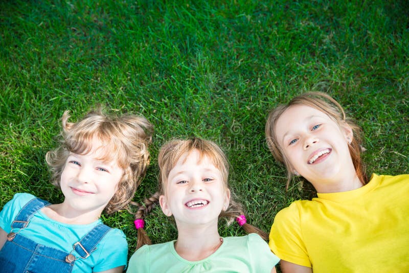 Group Of Happy Children Playing Outdoors Stock Image Image Of