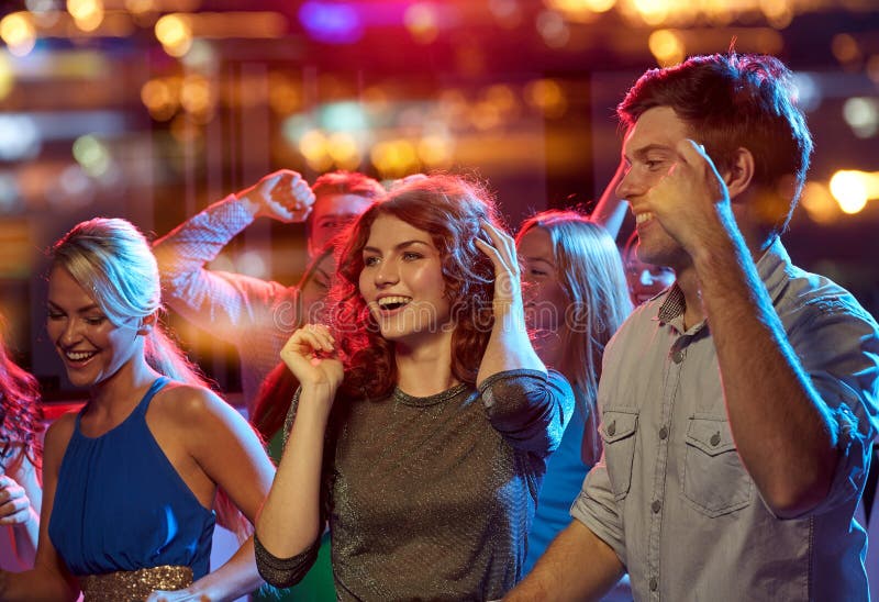 Group of Happy Friends Dancing in Night Club Stock Photo - Image of ...