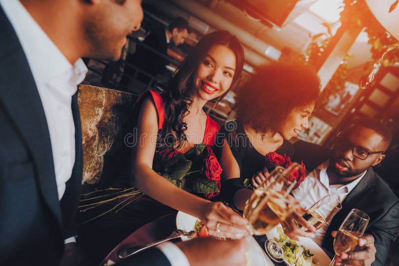 Group Happy Friends Enjoying Dating in Restaurant royalty free stock image Group Happy Friends Enjoying Dating in Restaurant royalty free stock image