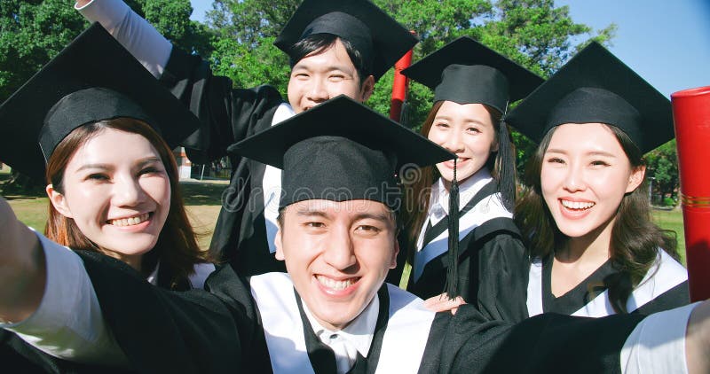 Group happy graduates students stock photography