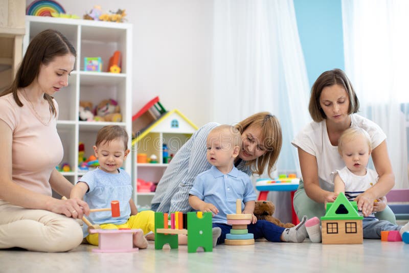 Group of Moms with Their Babies in Nursery. Socialization and