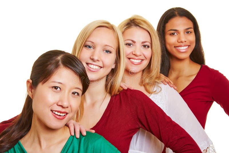 Group of happy women in a row stock images
