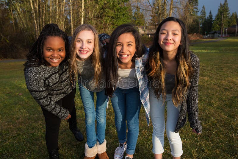 Group of happy young girl friends royalty free stock photo