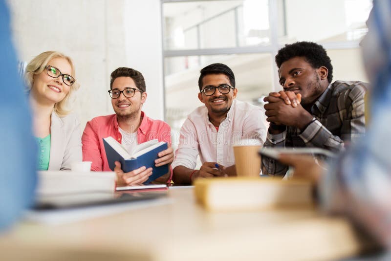 Group of high school students sitting at table