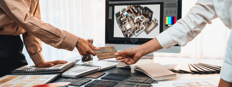 Group of interior architect at table choosing material selection. Insight stock image
