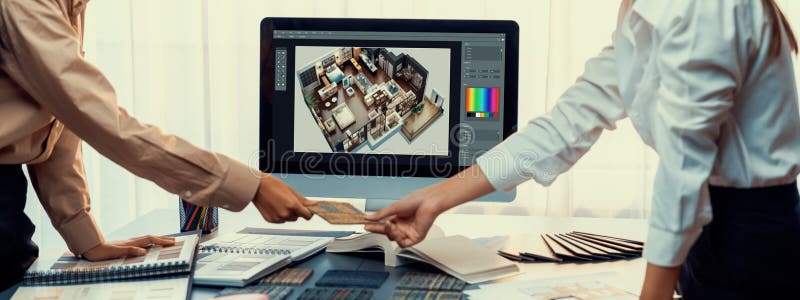 Group of interior architect at table choosing material selection. Insight royalty free stock image