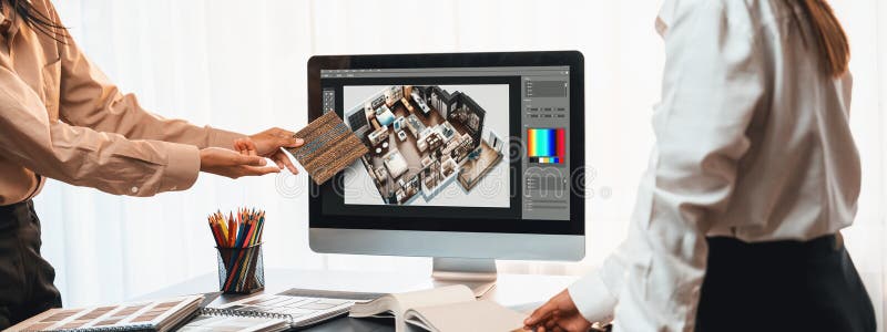 Group of interior architect at table choosing material selection. Insight royalty free stock image