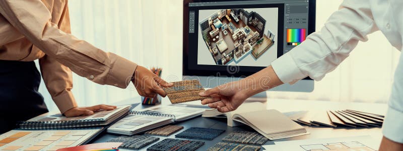 Group of interior architect at table choosing material selection. Insight royalty free stock photography