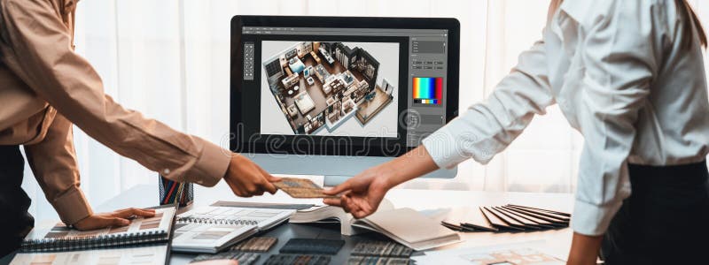 Group of interior architect at table choosing material selection. Insight stock photo