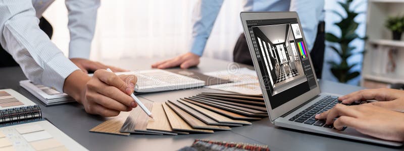 Group of interior architect at table choosing material selection. Insight royalty free stock photos