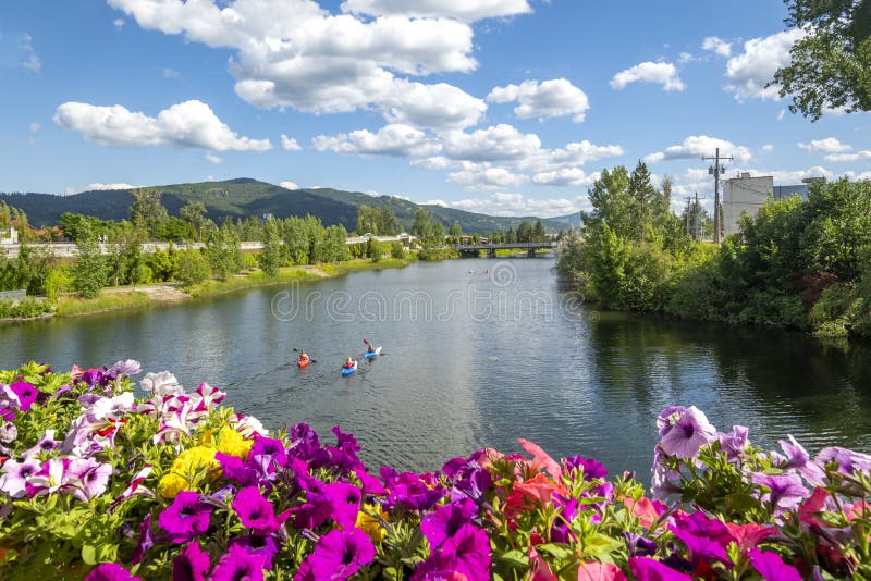 A group of kayakers under the Cedar St Bridge in Sandpoint, Idaho, on Lake Pend Oreille royalty free stock photos A group of kayakers under the Cedar St Bridge in Sandpoint, Idaho, on Lake Pend Oreille royalty free stock photos