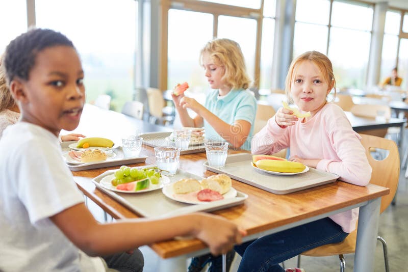 Group of Kids in the Canteen of the Elementary School Stock Image