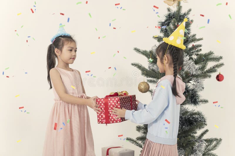 Group of kids give gift box celebrate christmas and new year stock photography Group of kids give gift box celebrate christmas and new year stock photography
