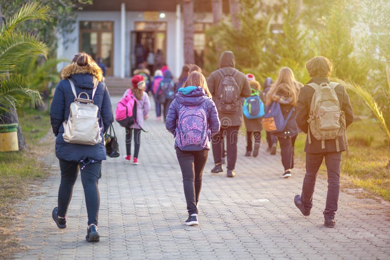 Group of kids going to school together, back to school stock image Group of kids going to school together, back to school stock image