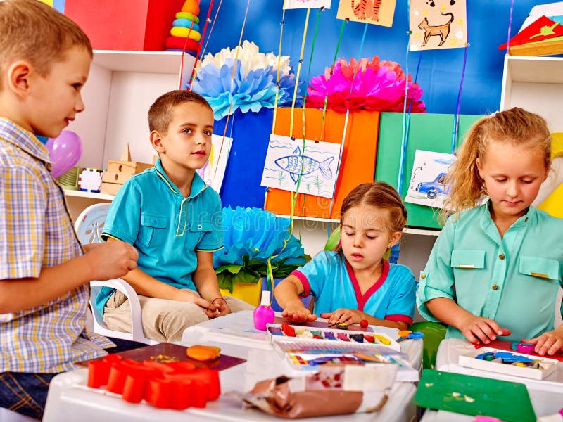 Group Kids Mold from Plasticine in Kindergarten . Stock Photo - Image ...