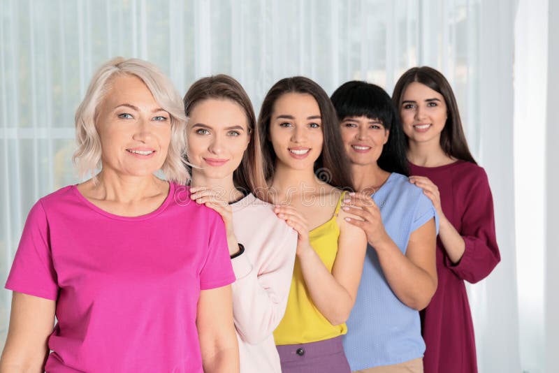 Group of ladies near window. Women power concept stock photos Group of ladies near window. Women power concept stock photos