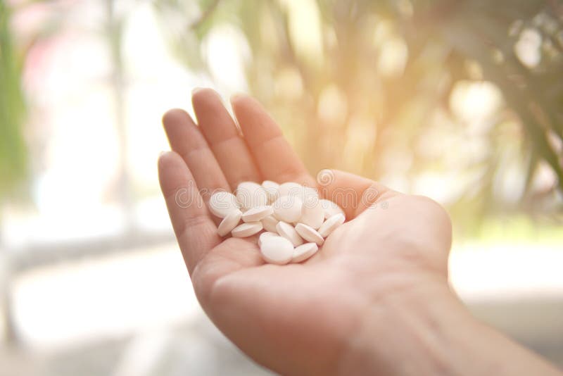 Group of Medicine pills in the hand stock image Group of Medicine pills in the hand stock image