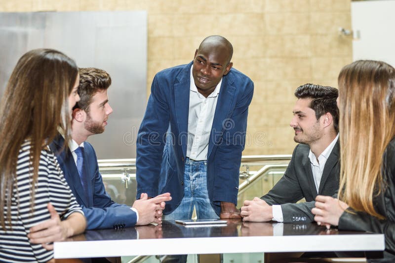 Group of multiethnic busy people working in an office