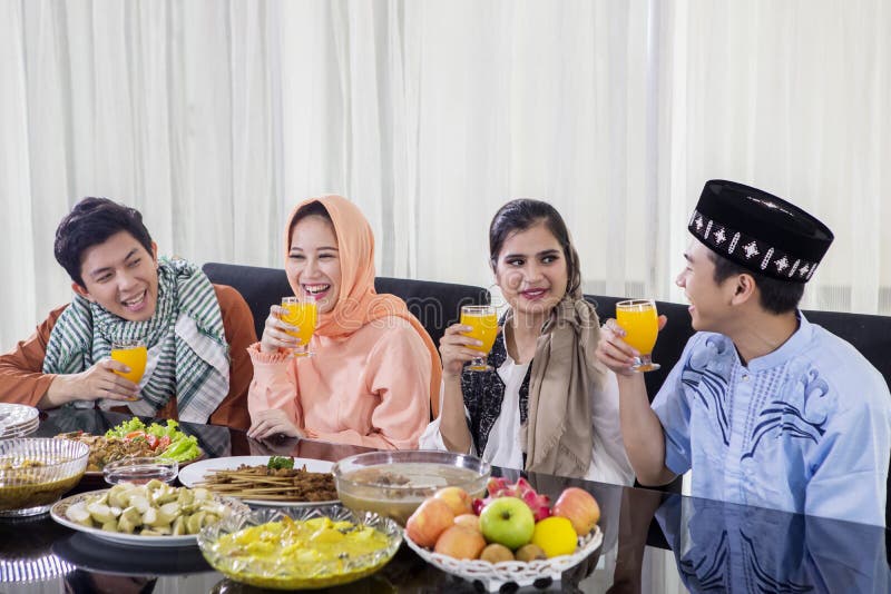 Muslim people enjoys drinks during break the fast