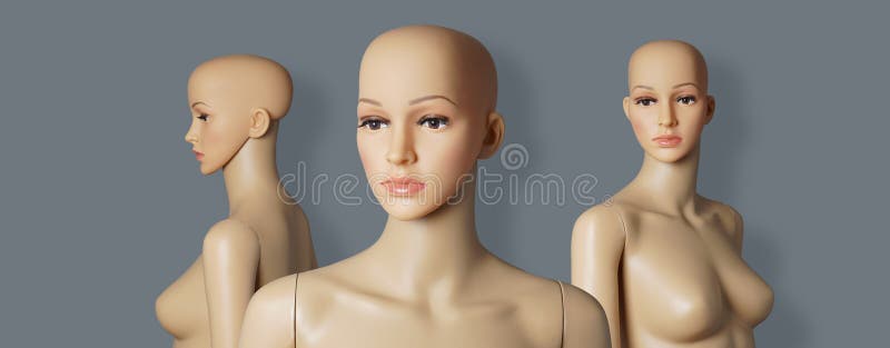 group of three naked and bald store window mannequins or display dummies with realistic faces