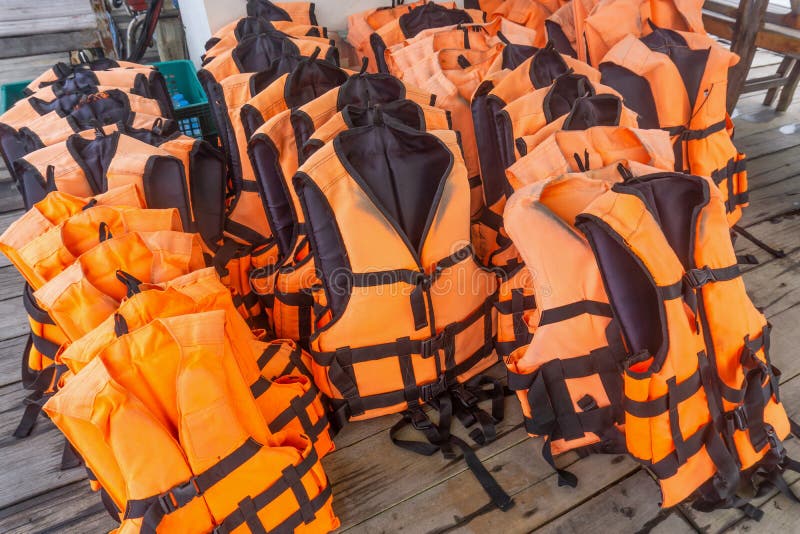 Group of Orange Life Jacket on Boat Stock Photo - Image of travel, boat ...