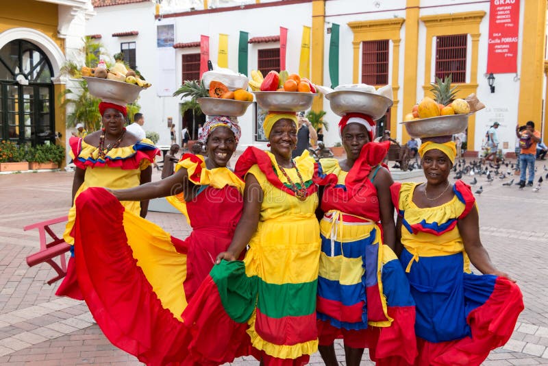 Group of palenqueras selling fruits in Cartagena. royalty free stock photography Group of palenqueras selling fruits in Cartagena. royalty free stock photography