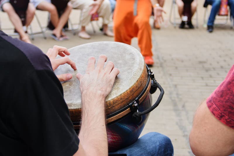 Group of people with African drums stock photo Group of people with African drums stock photo