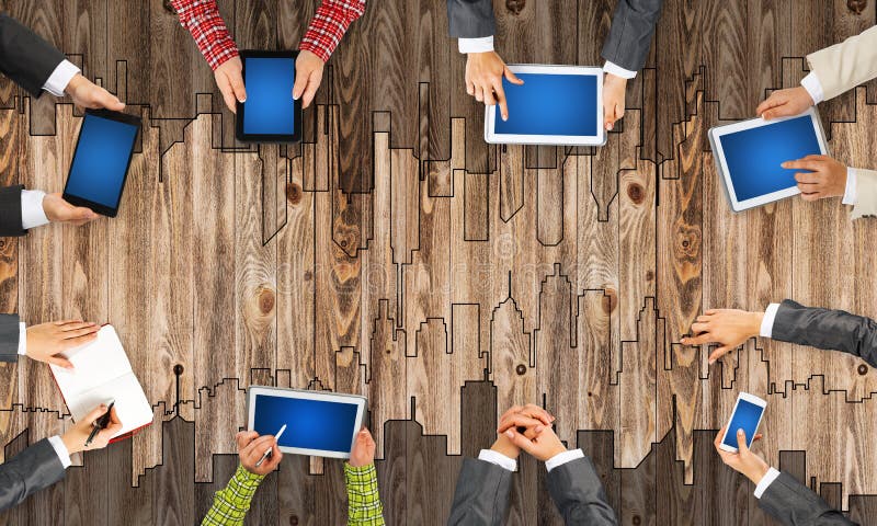 Top view of businesspeople sitting at table and using gadgets vector illustration Top view of businesspeople sitting at table and using gadgets vector illustration