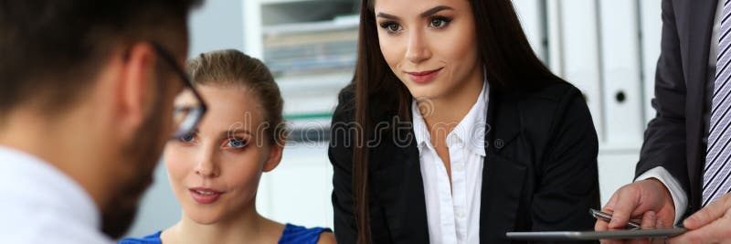 Group of people discuss bargain documents terms and conditions