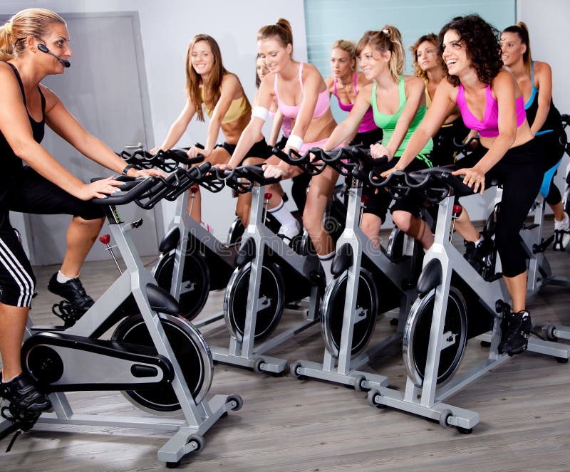 Group of people doing exercise on a bike