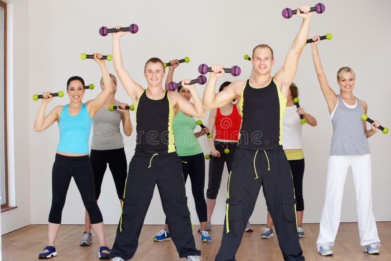 Group Of People Exercising In Dance Studio With Weights royalty free stock image