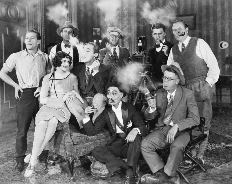 Group of People Sitting in a Living Room Smoking Stock Photo Image of