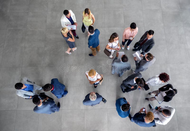 Large Group of People Standing and Talking on Business Meeting in the