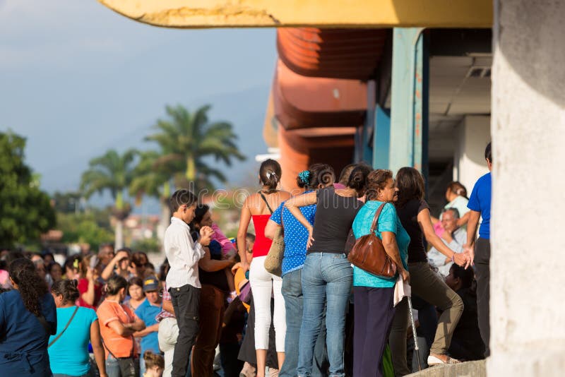 Group of people waiting in line at a public supermarket in Merida, Venezuela. stock image Group of people waiting in line at a public supermarket in Merida, Venezuela. stock image