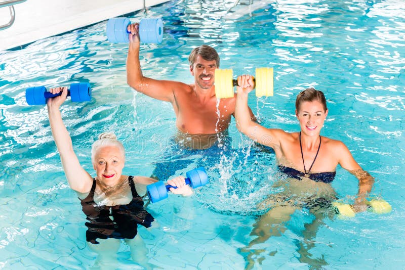 Group of people at water gymnastics or aquarobics royalty free stock images Group of people at water gymnastics or aquarobics royalty free stock images