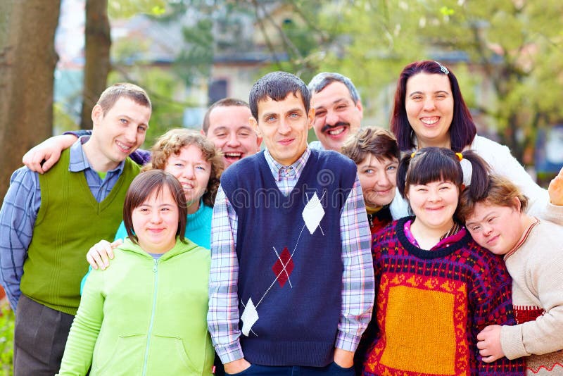 Group portrait of happy people with disabilities stock photos