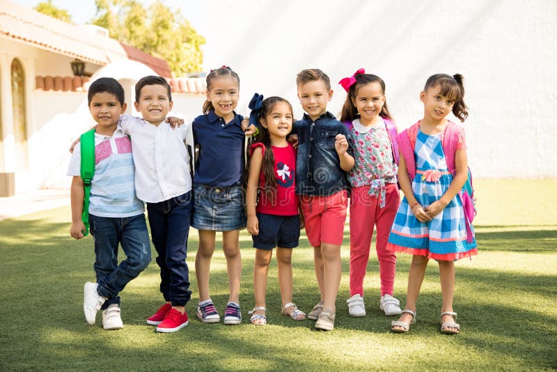 Group of preschoolers hanging out outdoors stock photos Group of preschoolers hanging out outdoors stock photos