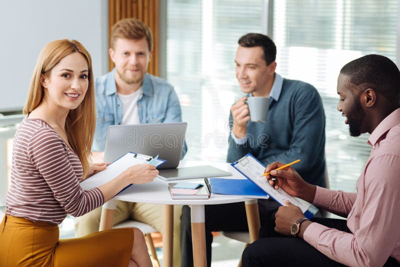 Group Of Professionals Working Together In Office Stock Image Image
