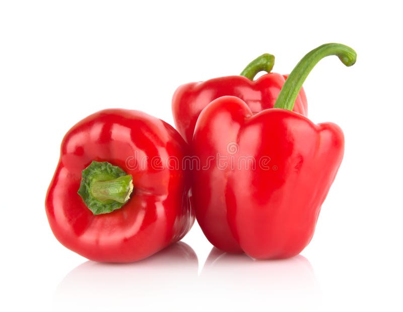 Group of red bell peppers isolated on white