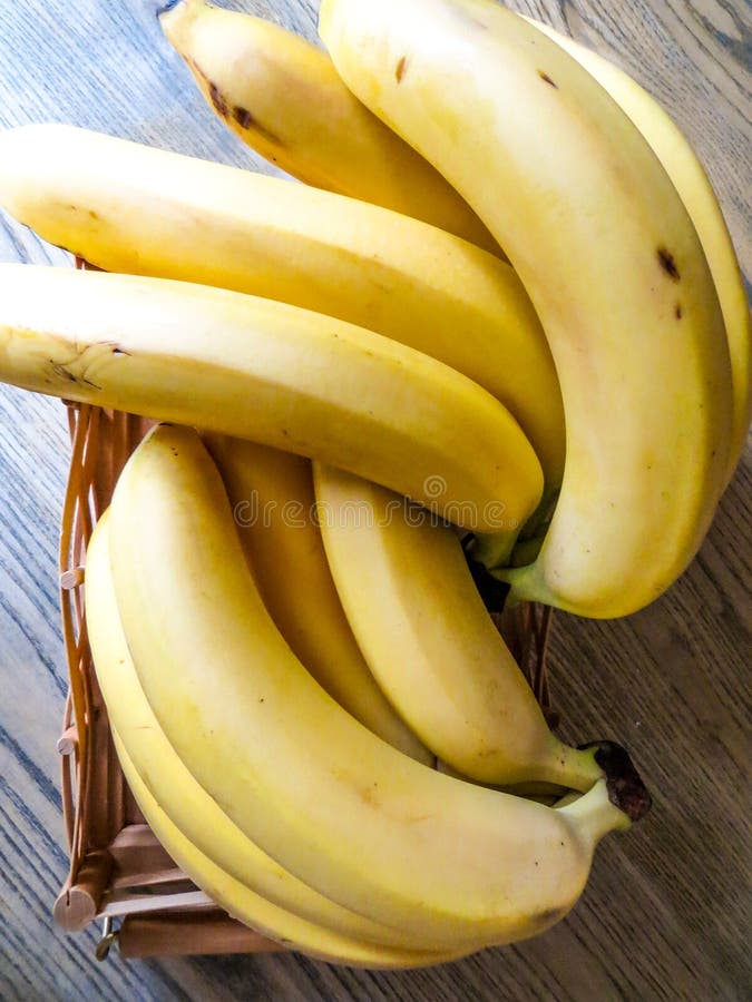 Lot Of Bananas In Group At The Grocery. Banana Is An Edible Fruit Botanically A Berry Produced