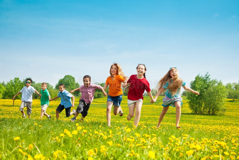 Group of running kids stock image Group of running kids stock image