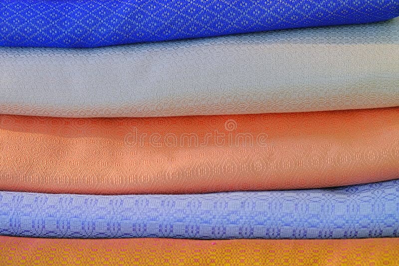 Close-up multicolored of silk cotton from handmade on Thai style background, fashion. Close-up multicolored of silk cotton from handmade on Thai style background, fashion