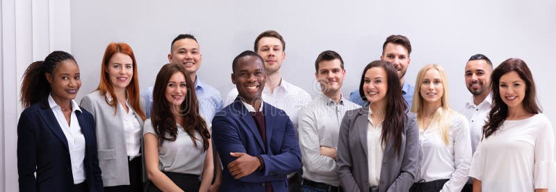 Group of Smiling Young Office Workers Standing Stock Image - Image of ...