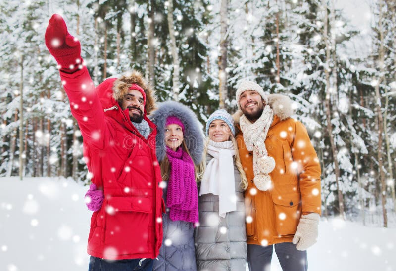 Group of Smiling Men and Women in Winter Forest Stock Photo - Image of ...