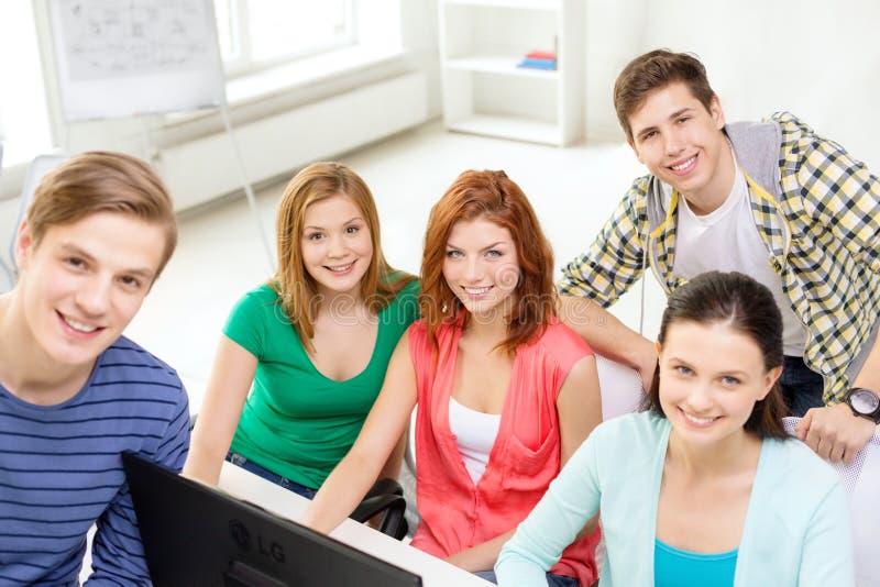 Group of smiling students having discussion stock photo