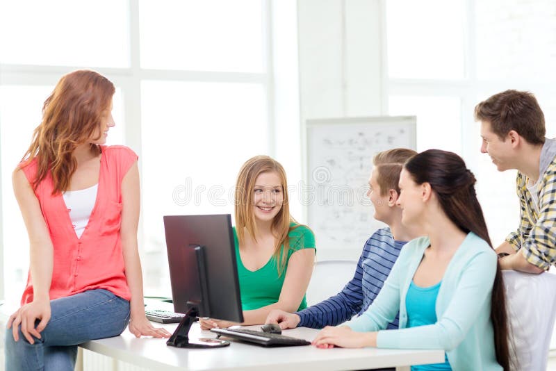 Group of smiling students having discussion royalty free stock photo